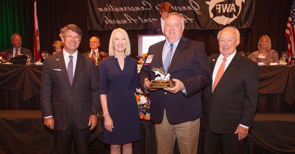 Stuart McGregor '84 receives his award for Fisheries Conservationist of the Year.